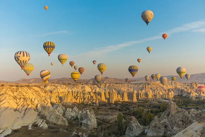 Cappadocia Often described as a ‘fairytale land’, Cappadocia’s hills and valleys are filled with caves, tunnels, and ‘fairy chimneys