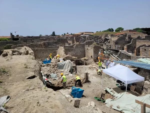 The largest excavation at Pompeii in a generation is uncovering nearly an entire city block, revealing remarkable discoveries that offer fresh insights into life and death beneath the looming presence of Vesuvius